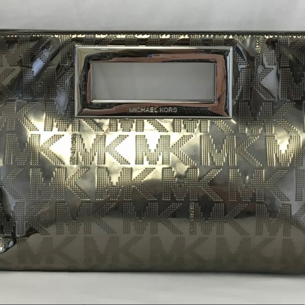 Authentic Michael Kors Silver Patent Leather Monogram Embossed Clutch Purse